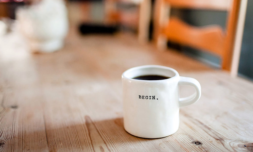 Taza de café con la leyenda